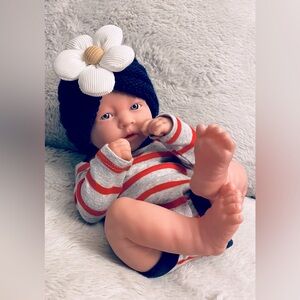 Berenguer Doll life-like soft vinyl infant girl doll with 4 onesies & 2 hats